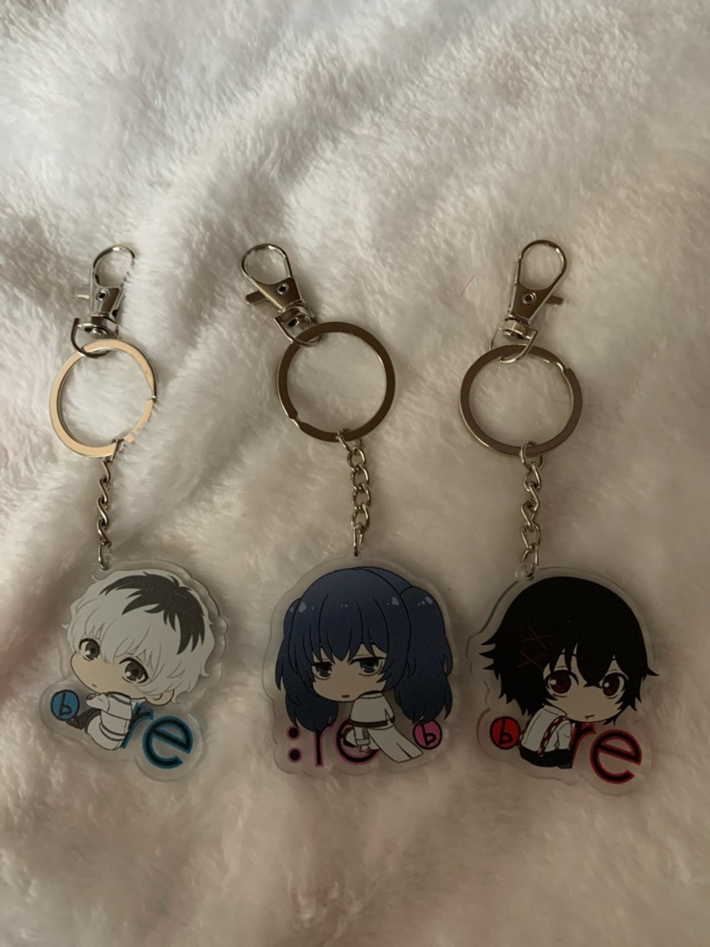 Anime Chibi Character Keychain Trio - Blue, Black, White